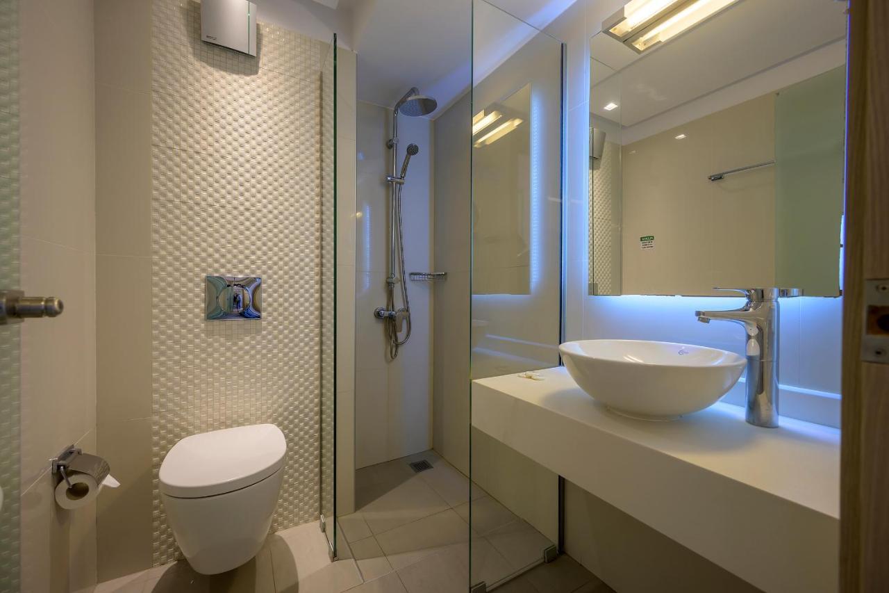 Mythos Suites Hotel Тигаки Экстерьер фото
