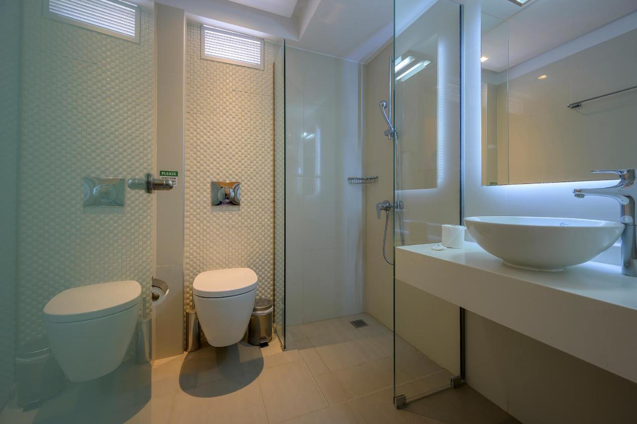 Mythos Suites Hotel Тигаки Экстерьер фото
