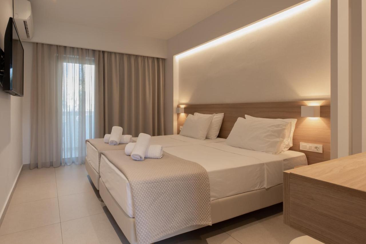 Mythos Suites Hotel Тигаки Экстерьер фото