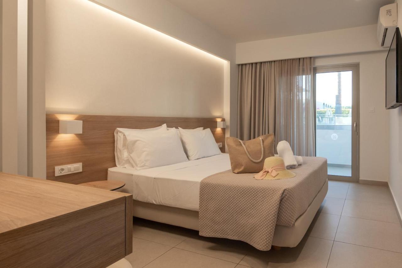 Mythos Suites Hotel Тигаки Экстерьер фото