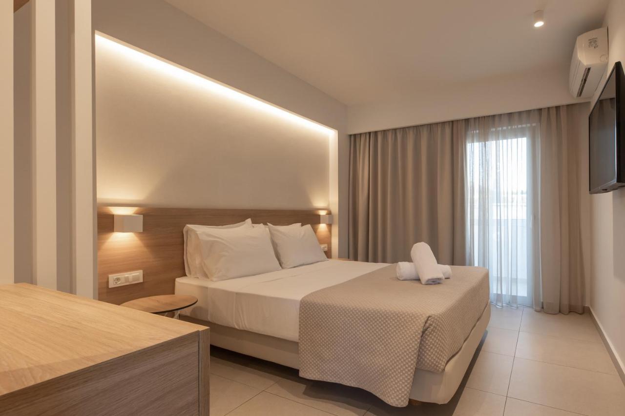 Mythos Suites Hotel Тигаки Экстерьер фото
