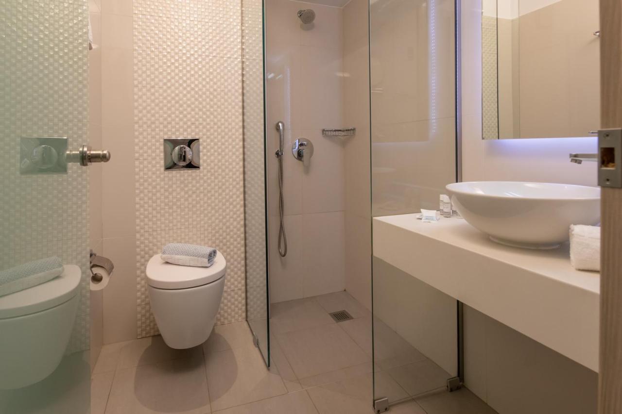Mythos Suites Hotel Тигаки Экстерьер фото