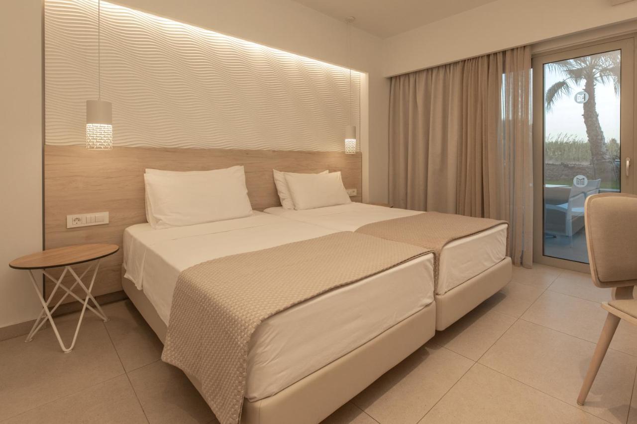 Mythos Suites Hotel Тигаки Экстерьер фото
