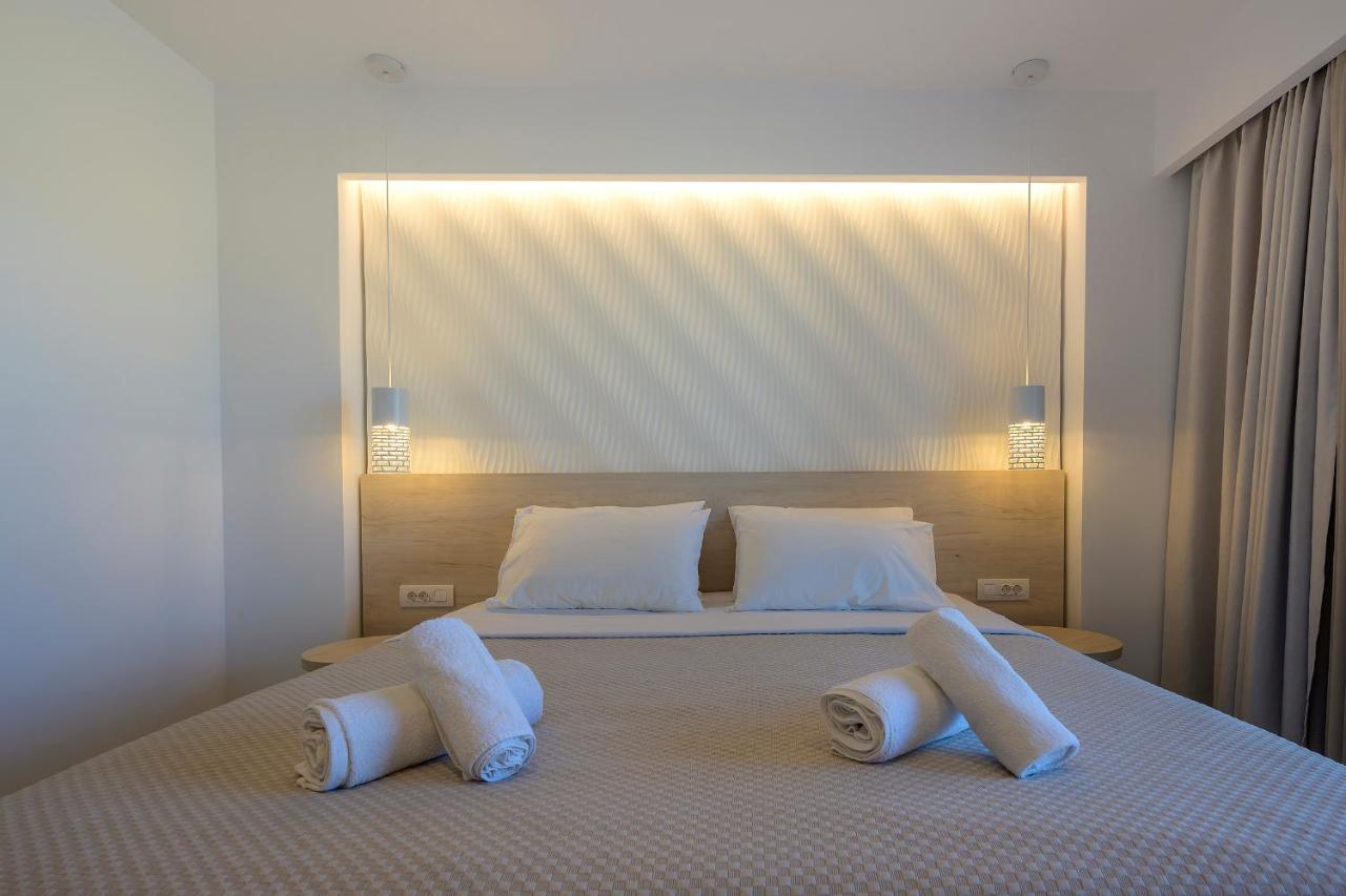 Mythos Suites Hotel Тигаки Экстерьер фото