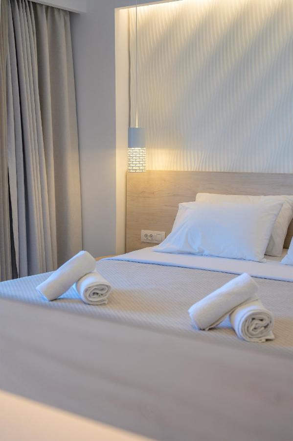 Mythos Suites Hotel Тигаки Экстерьер фото