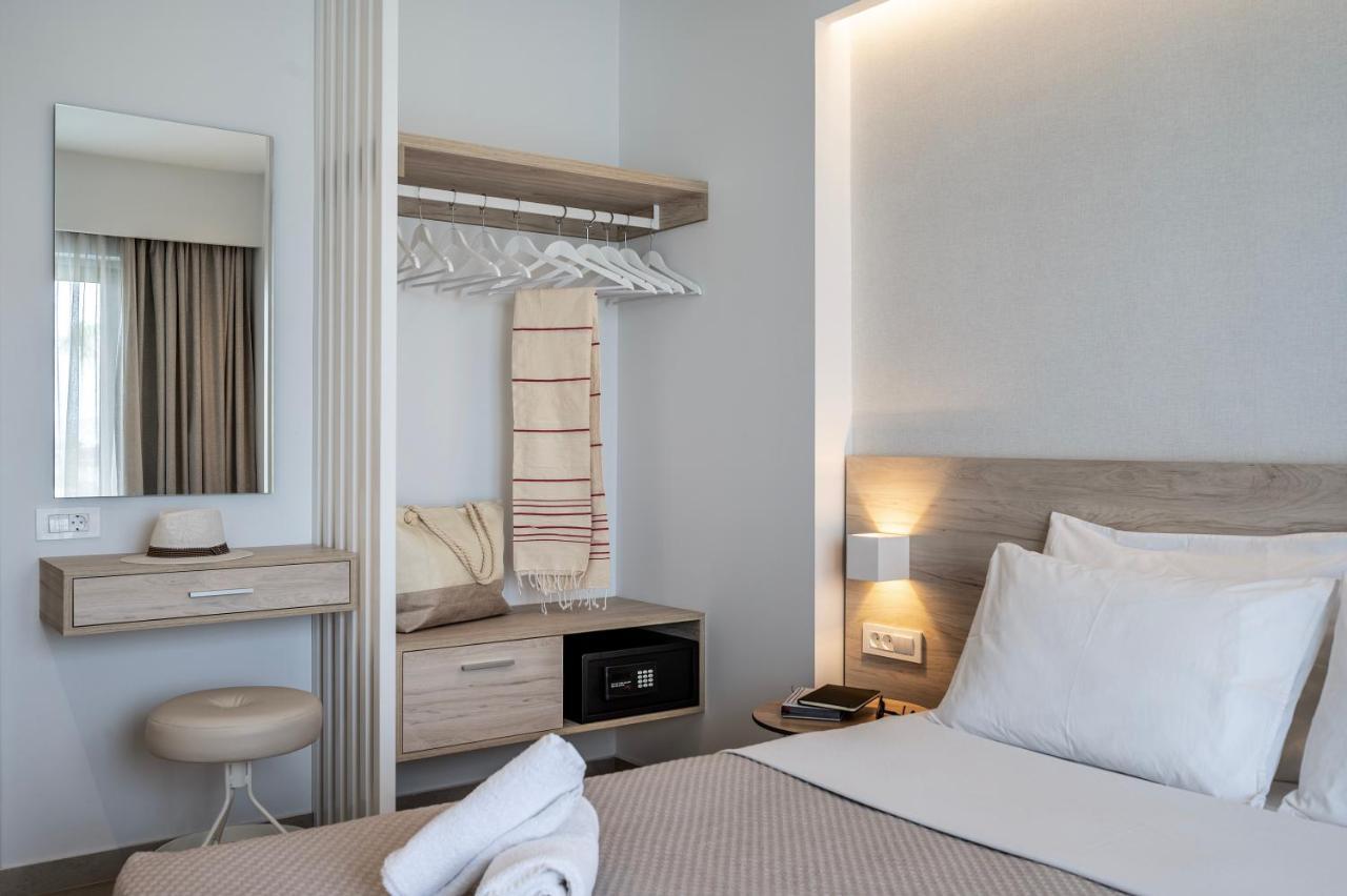 Mythos Suites Hotel Тигаки Экстерьер фото
