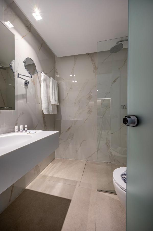 Mythos Suites Hotel Тигаки Экстерьер фото