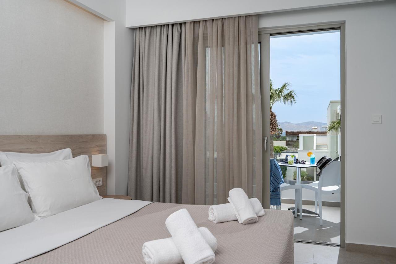 Mythos Suites Hotel Тигаки Экстерьер фото