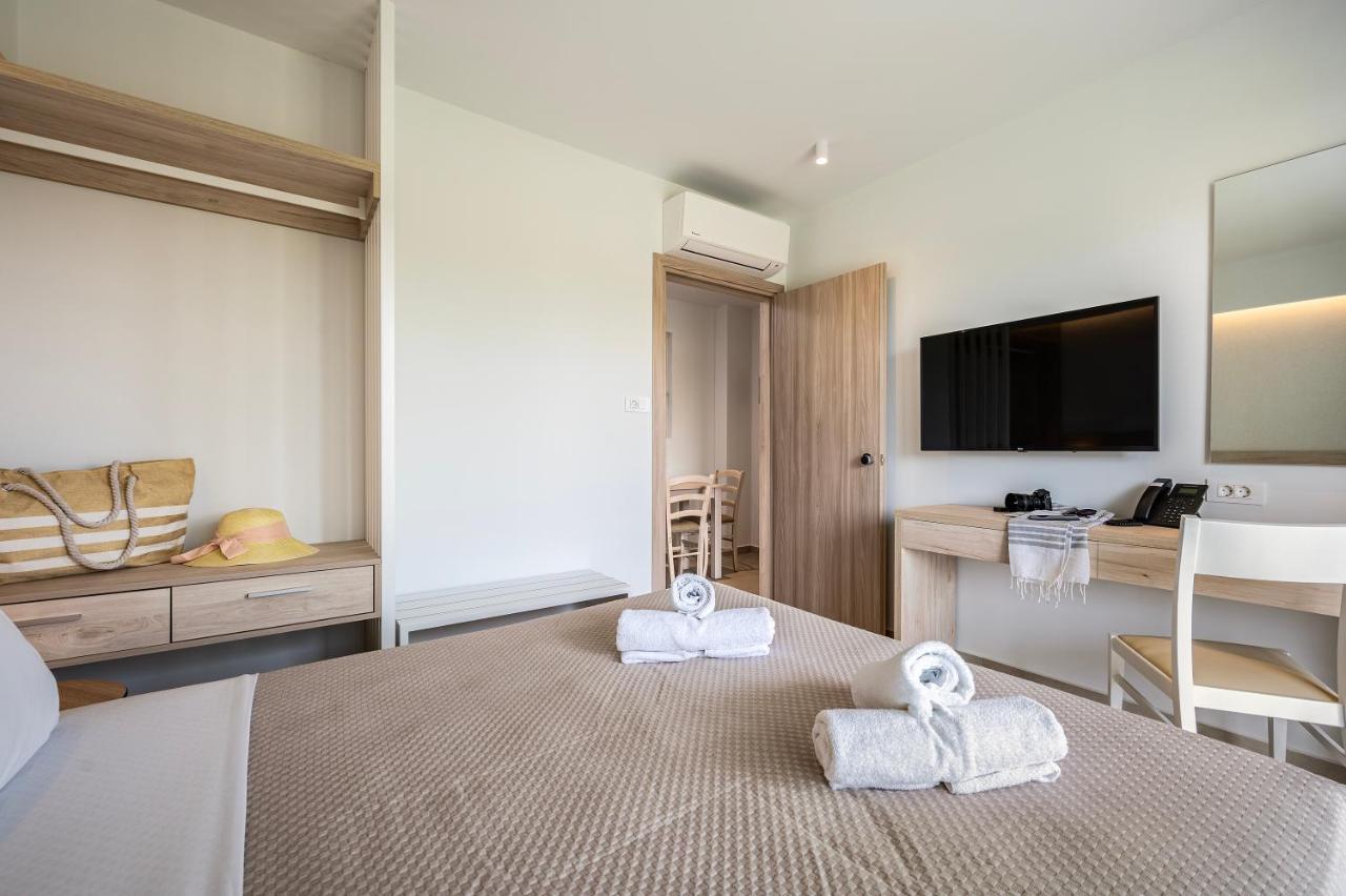 Mythos Suites Hotel Тигаки Экстерьер фото