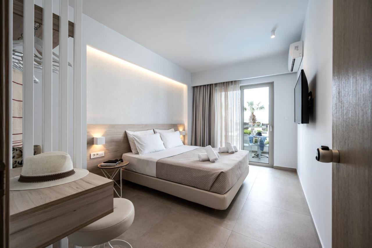 Mythos Suites Hotel Тигаки Экстерьер фото