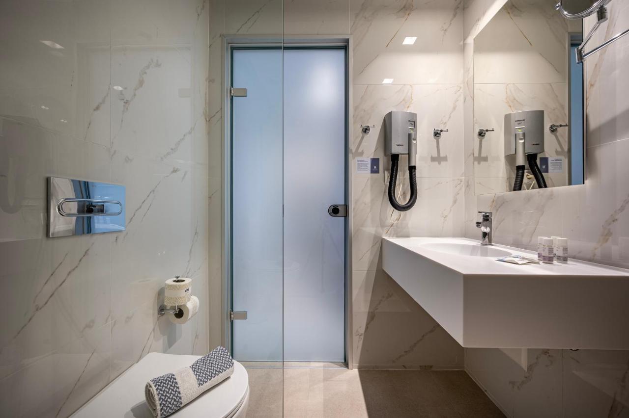 Mythos Suites Hotel Тигаки Экстерьер фото