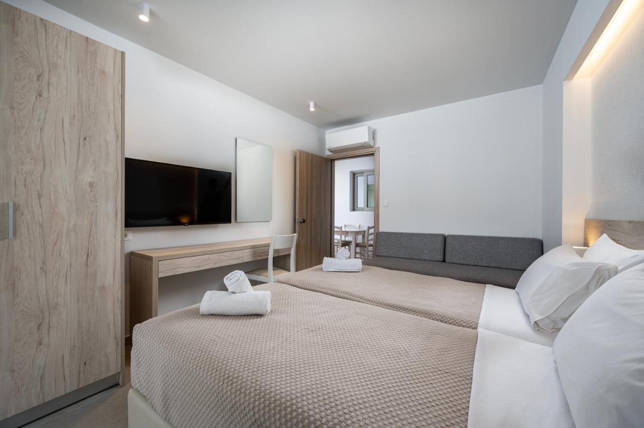 Mythos Suites Hotel Тигаки Экстерьер фото