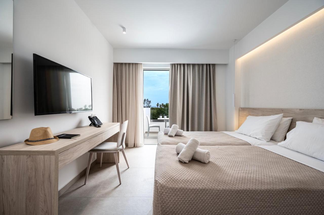 Mythos Suites Hotel Тигаки Экстерьер фото