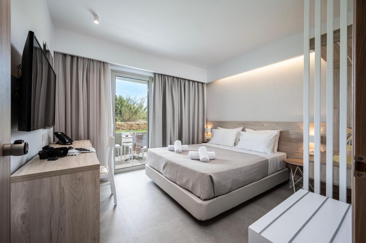 Mythos Suites Hotel Тигаки Экстерьер фото
