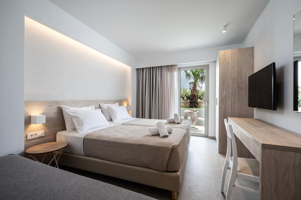 Mythos Suites Hotel Тигаки Экстерьер фото