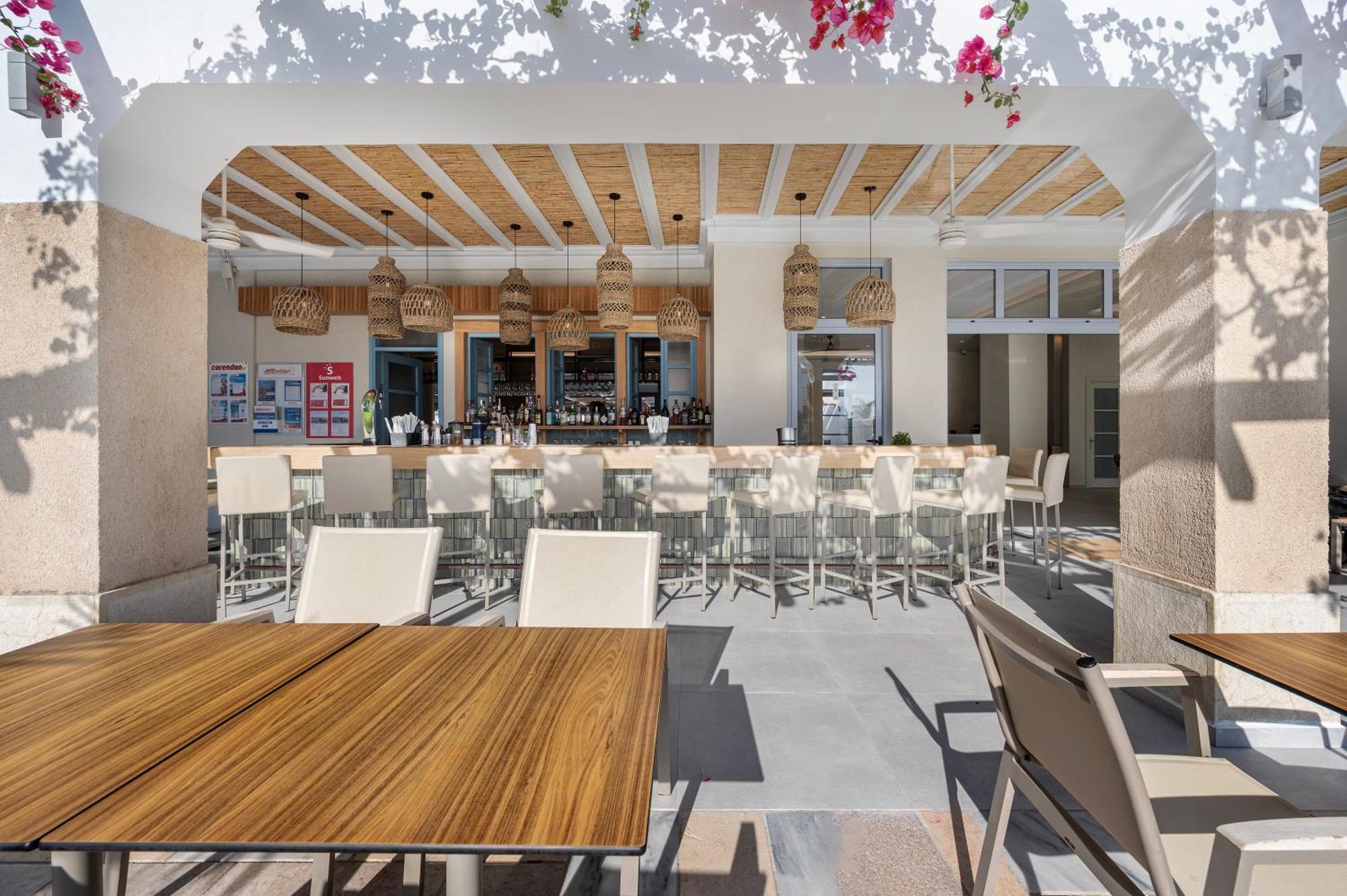 Mythos Suites Hotel Тигаки Экстерьер фото